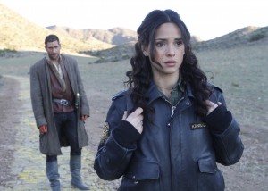 EMERALD CITY -- "Prison of the Abject" Episode 102 -- Pictured: (l-r) Oliver Jackson Cohen as Lucas, Adria Arjona as Dorothy -- (Photo by: Rico Torres/NBC)