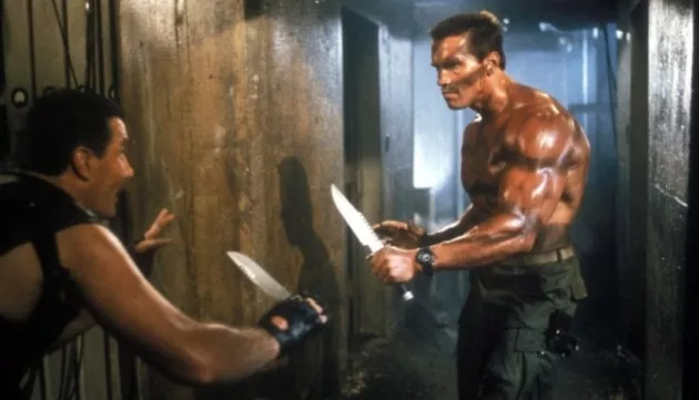 arnold-schwarzenegger-commando-deleted-scene-man-beaten-death-wi-1172283-1280x0